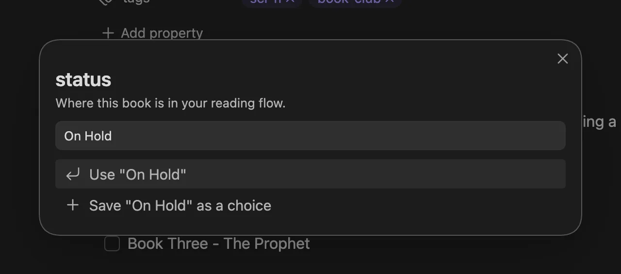 Single-mode Auto Property prompt for “status” showing its description, the typed query “On Hold”, and two action rows: Use “On Hold” and Save “On Hold” as a choice.